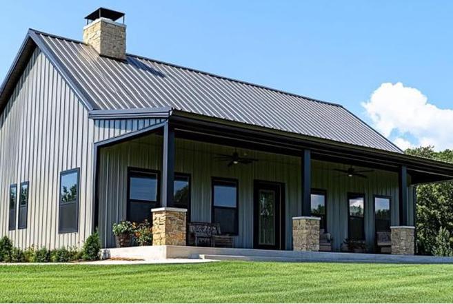 The Grounded Ridge barndominium design concept with a gabled metal roof and covered porch