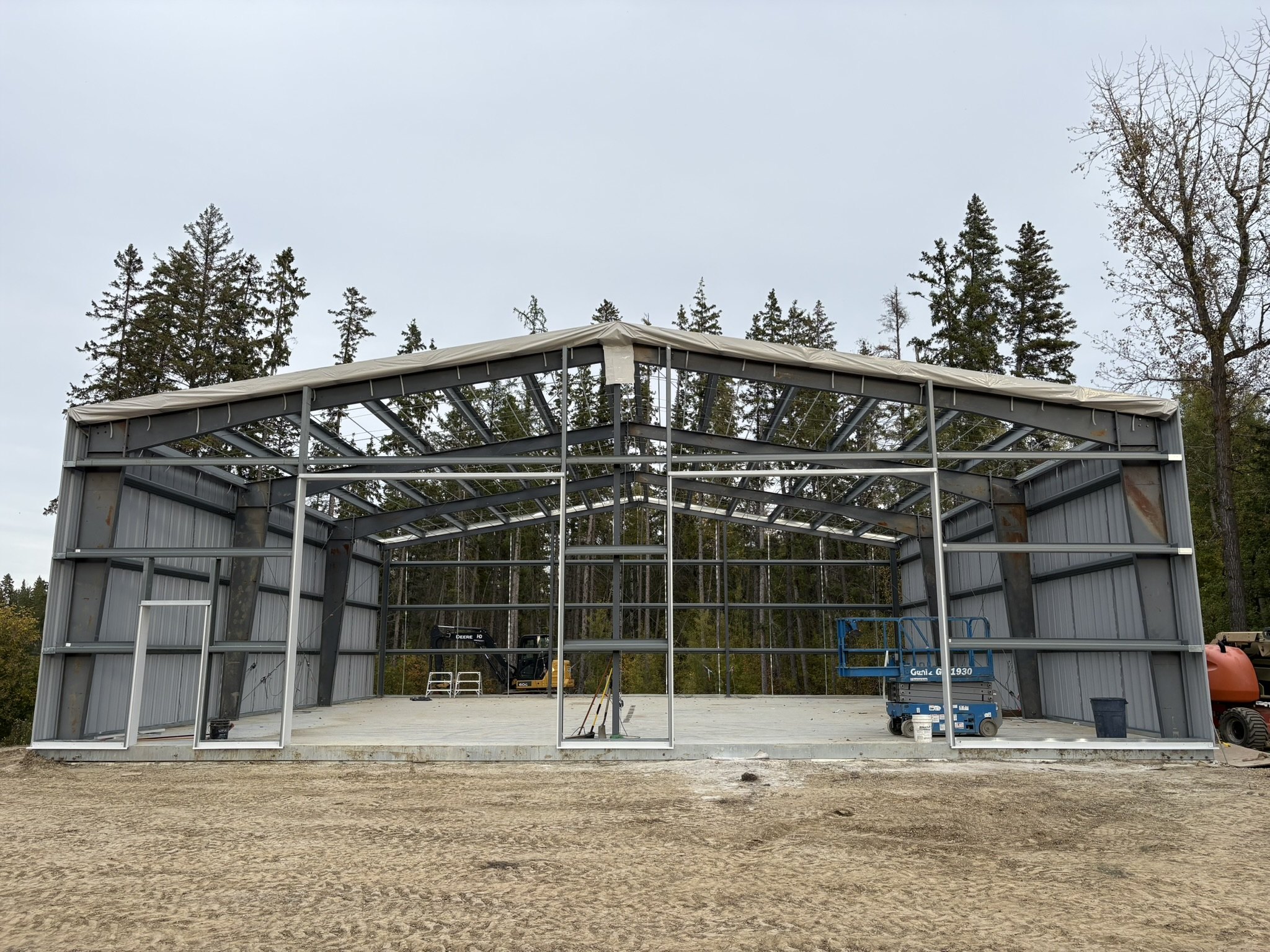 Steel building frame and exterior cladding in progress